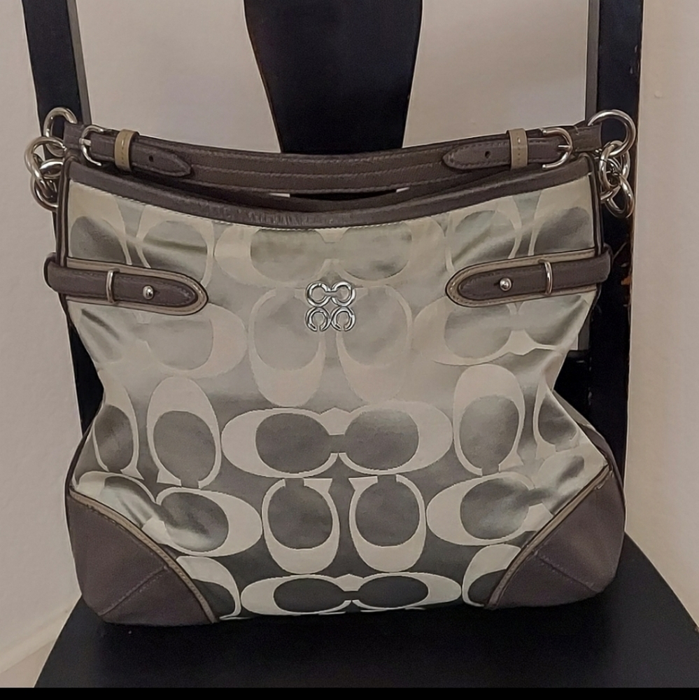 Silver and grey Coach purse